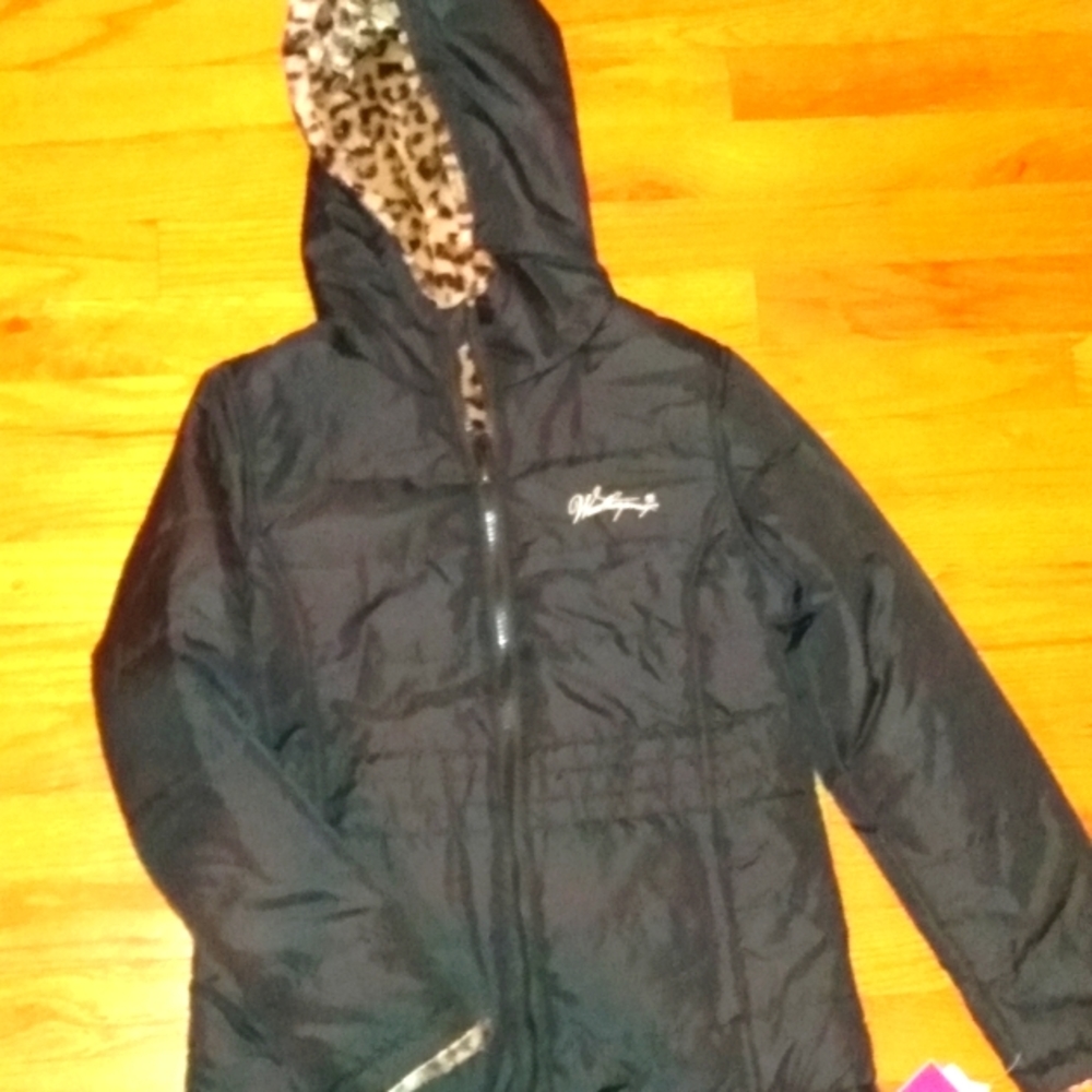 Girl's Weatherproof brand reversible jacket is a girl's size Large (14).